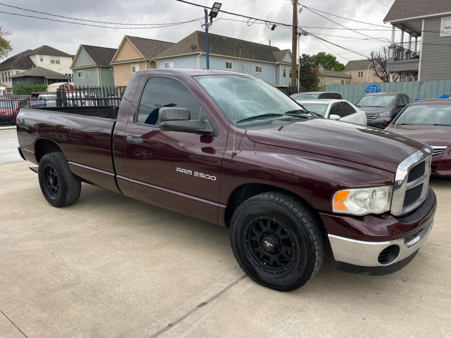 2004 Maroon /Black Dodge Ram 2500 Laramie 2WD (3D7KA26C44G) with an 5.9L L6 OHV 24V TURBO DIESEL engine, Automatic transmission, located at 1501 West 15th St., Houston, 77008, (713) 869-2925, 29.797941, -95.411789 - Photo#1